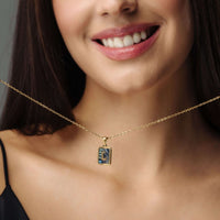 Thumbnail for Happiness Initial Necklace displayed on a smiling woman, showcasing its elegant gold design by Brother & Sisters.