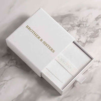 Thumbnail for B&S Layla anklet inside white slide-drawer gift box with embossed suede pouch on marble — gift jewelry packaging