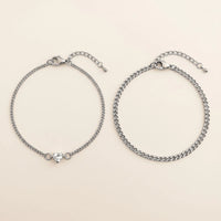 Thumbnail for Heart Bond Matching Bracelet Set in Silver — his and hers bracelets side by side: fine curb chain with a tiny heart crystal for her, slim curb chain for him