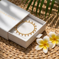 Thumbnail for Drop Bead Anklet in a box by Brother & Sisters, featuring tiny gold beads for a shimmering summer-ready style.