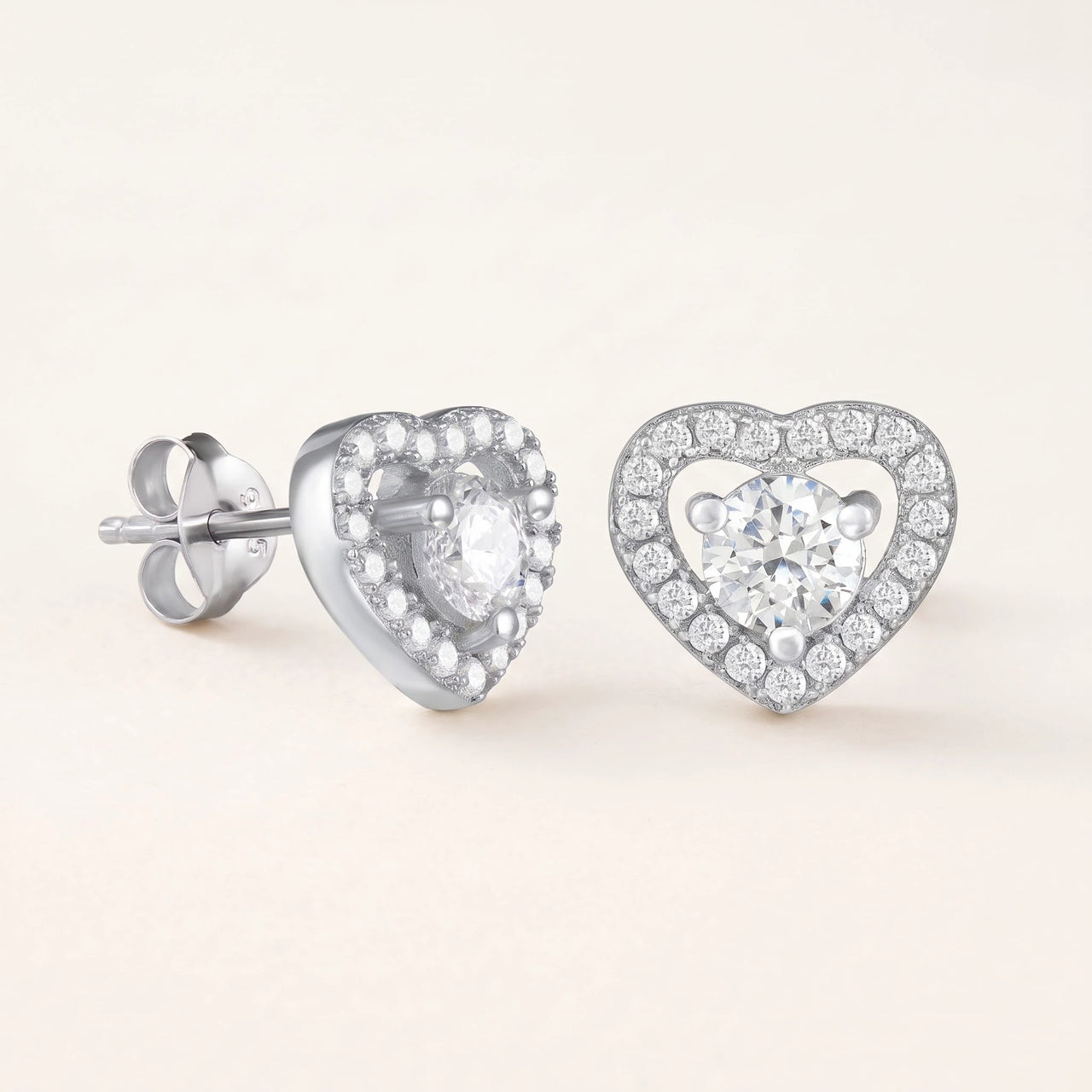 Heart earrings — product photo on a white background, silver | SKU: 1953493